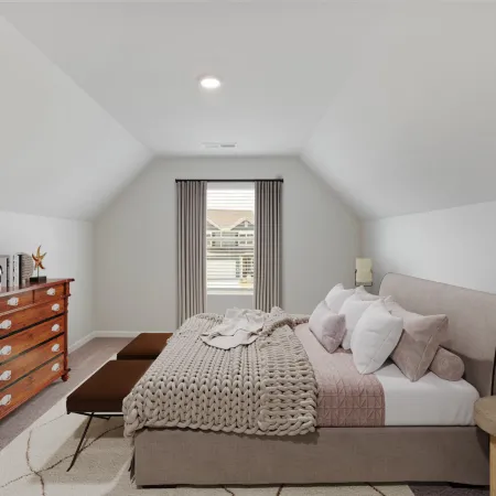 Cozy bedroom with a large bed, knitted blanket, wooden dresser, bench seats, and natural light from window.