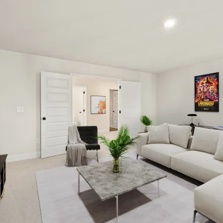 a living room with white furniture