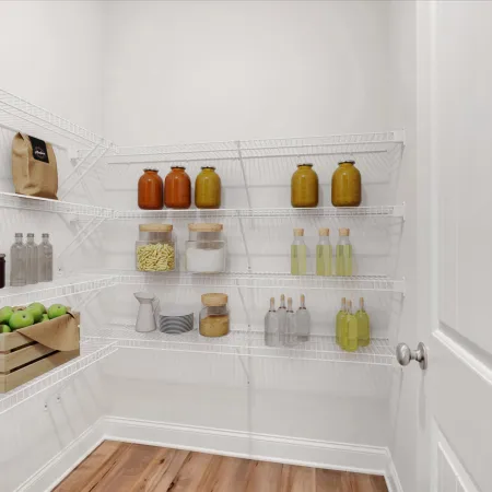Organized pantry with shelves showcasing jars, bottles, and food items against a bright, minimalist background.