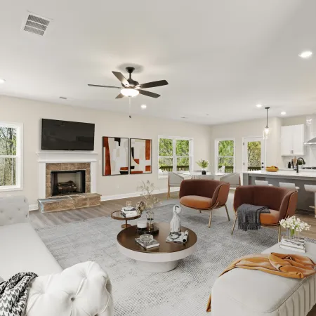a large living room with a fireplace