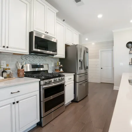 a modern kitchen with stainless steel appliances