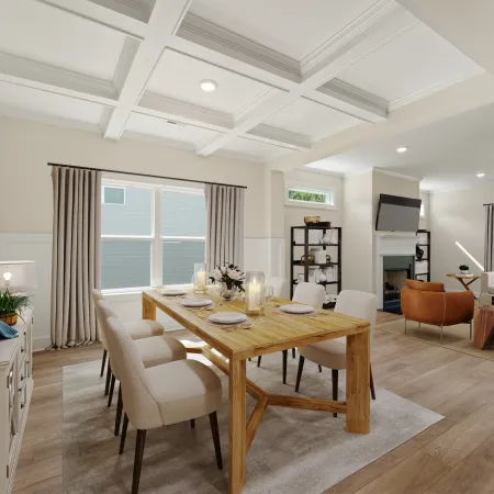 Bright modern dining area with wooden table, beige chairs, large window, and adjacent living room with fireplace.