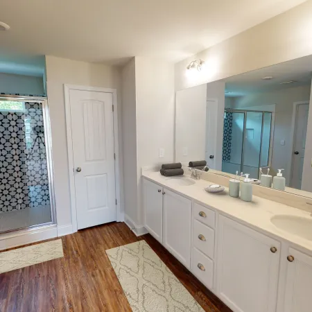 a kitchen with a sink and a mirror