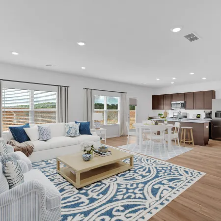 Bright modern living room with soft furnishings and stylish decor, showcasing a cozy and inviting atmosphere.