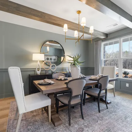 a dining room with a round table
