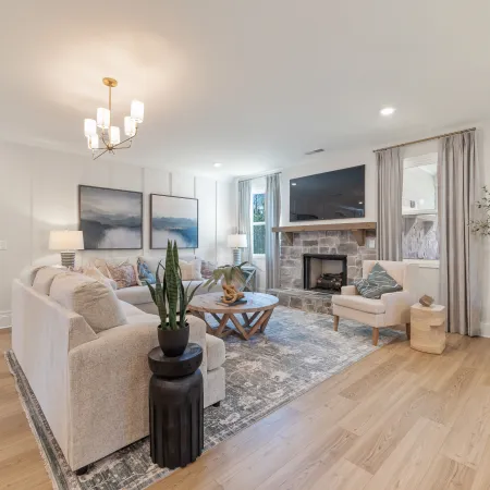 a living room with a fireplace