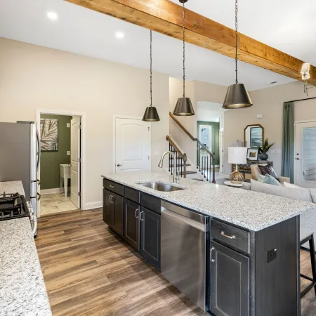 a kitchen with a marble island