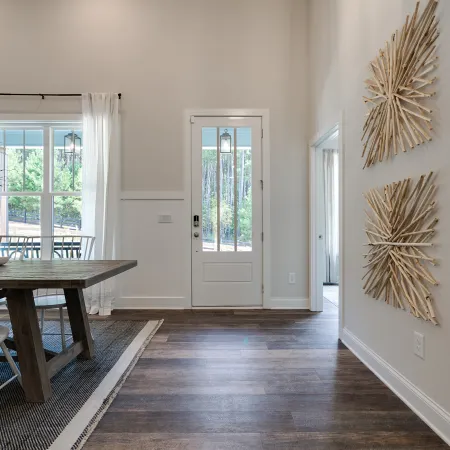 a room filled with furniture and a large window
