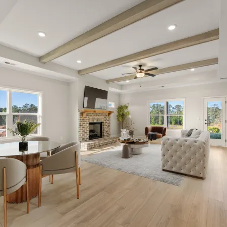 a large living room with a fireplace