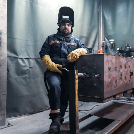 a man in a uniform sitting on a wooden box