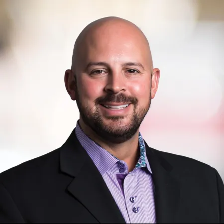 Travis E. Fogle