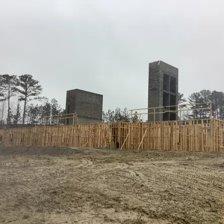 Essayon Construction Group wood framing Crossing Pointe at Christian City Union City GA