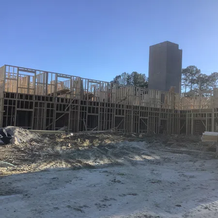 Essayon Construction Group wood framing Crossing Pointe at Christian City Union City GA