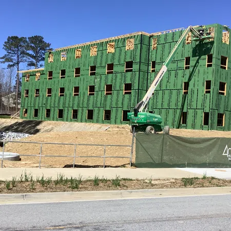 Essayon Construction Group wood framing Crossing Pointe at Christian City Union City GA