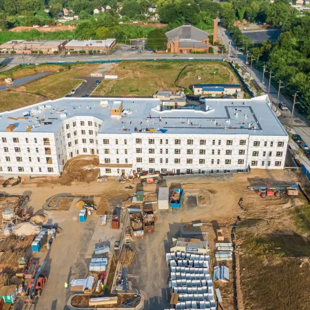 a large building with a parking lot