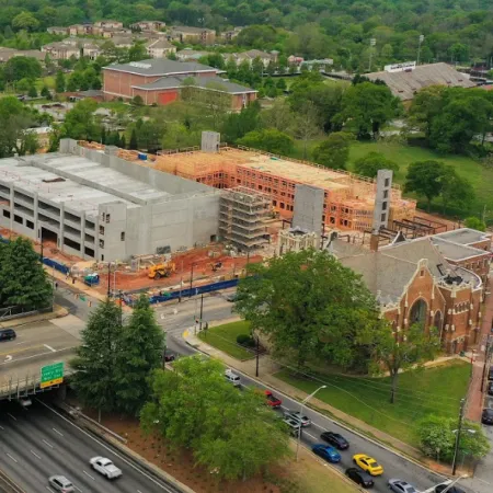 a large building with a parking lot