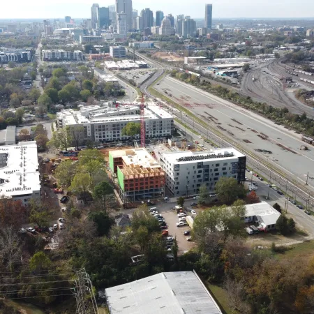 a city with a freeway and buildings