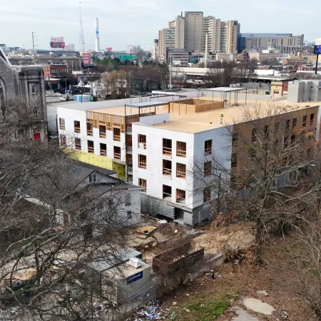 a building with trees in front of it