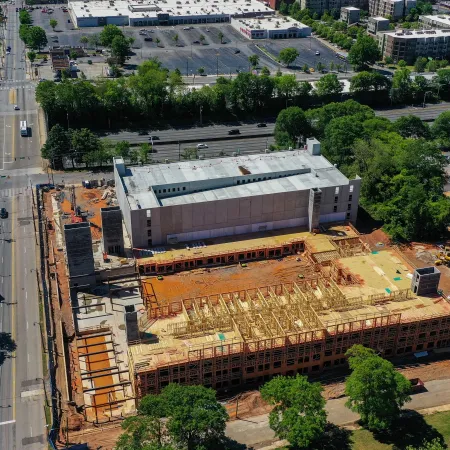 a large building with a parking lot