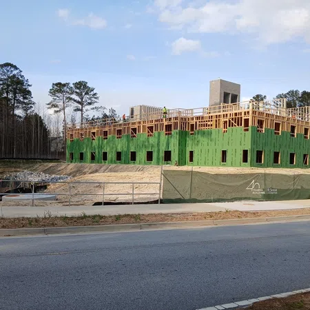 Essayon Construction Group wood framing Crossing Pointe at Christian City Union City GA