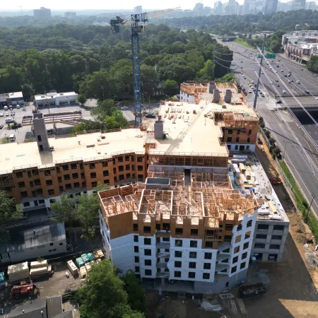 a large building with a parking lot