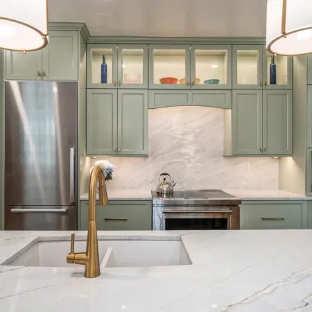 a kitchen with a stainless steel sink