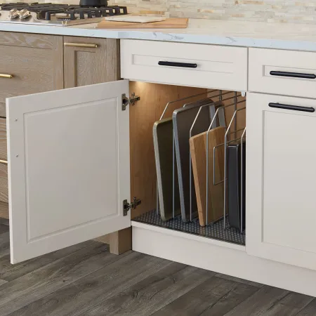 a kitchen with white cabinets