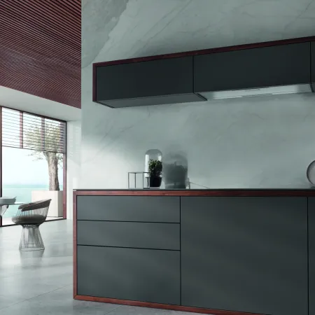 a kitchen with a bar and chairs