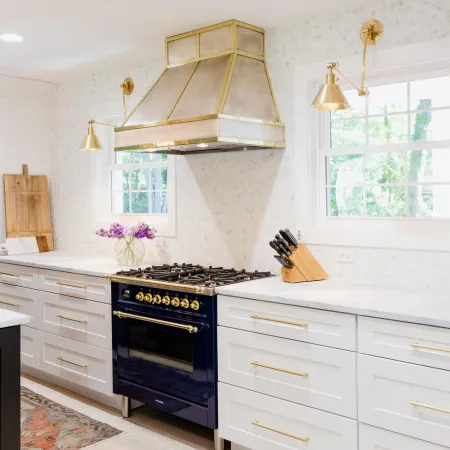 a kitchen with white cabinets