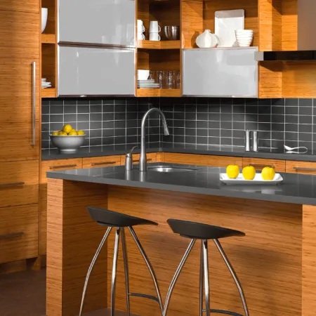 a kitchen with stools and a sink