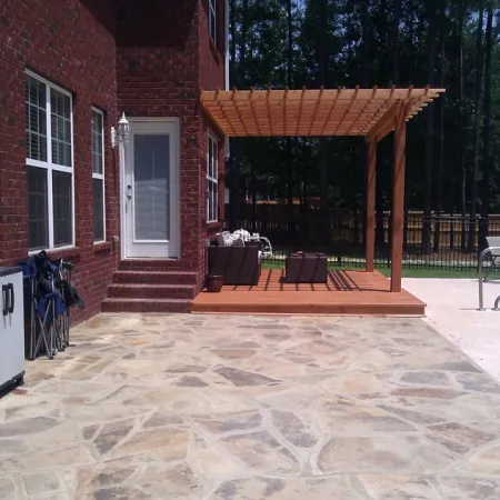 a brick building with a covered patio