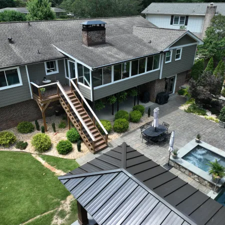 a house with a deck and a pool