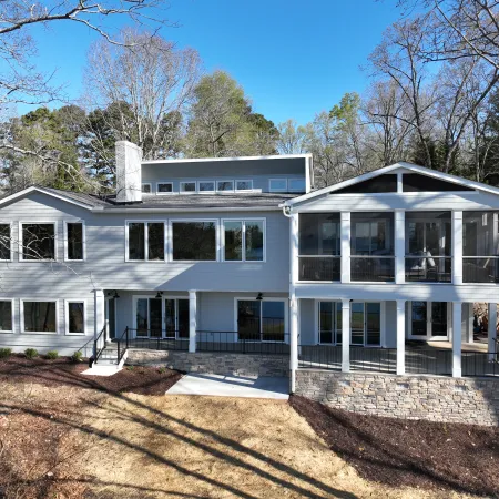 a white house with a blue sky