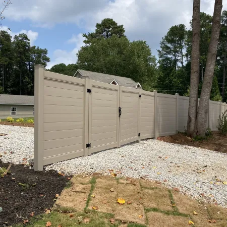 a white shed in a yard