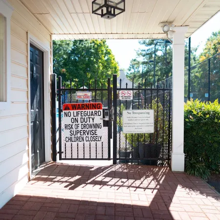 a gate with a sign on it