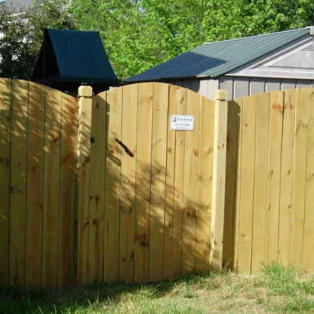 a wooden fence with a blue roof