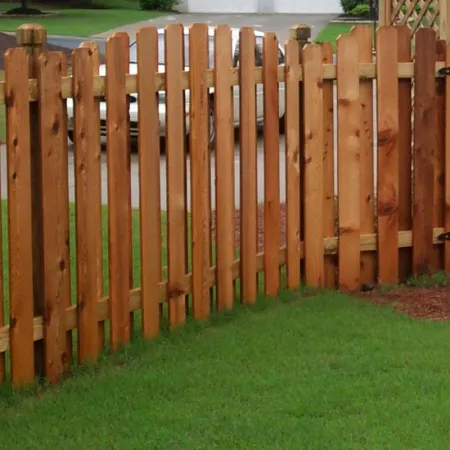 a fence with a bird on it