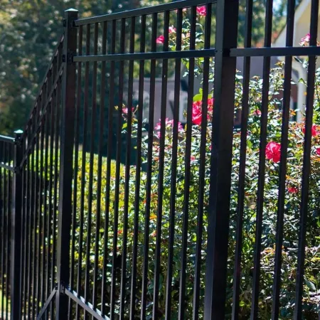 a black gate with flowers