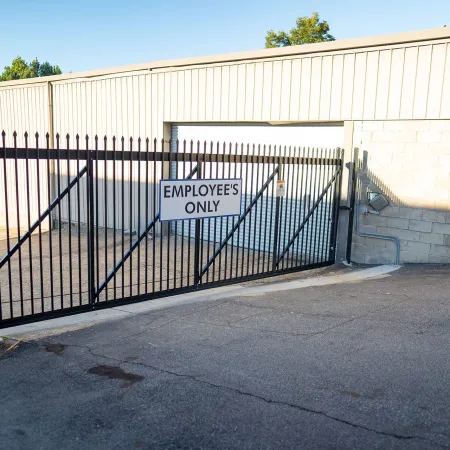 a gate with a sign on it