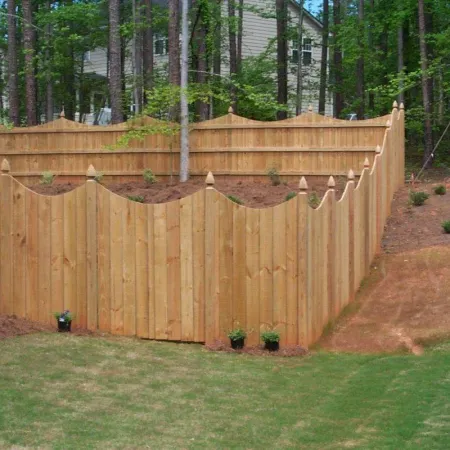 a fenced in yard with a wood structure in the middle