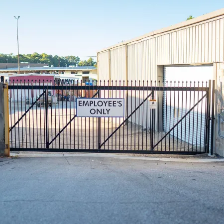 a gate with a sign on it