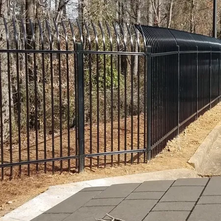 a gated off area with a car parked in the background