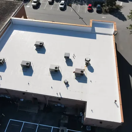 a rooftop with cars parked on it