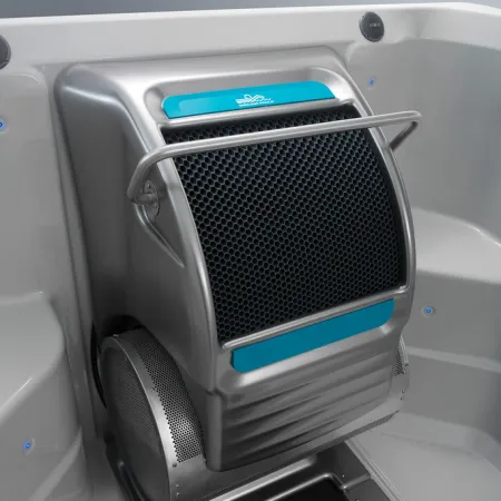 Silver AquaJogger resistance treadmill with blue accents and safety bar inside a white aquatic exercise pool.