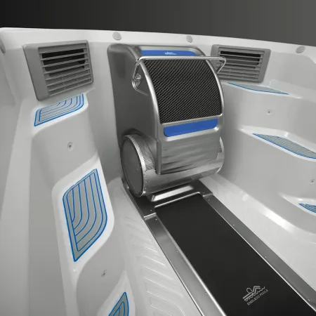 Modern aquatic treadmill with adjustable seat and non-slip surfaces in a white, blue-accented water therapy pool.