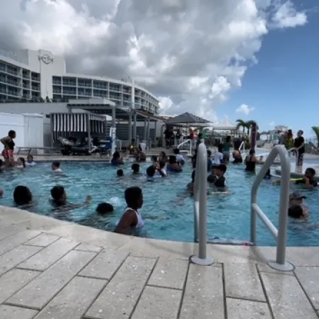 a group of people in a pool