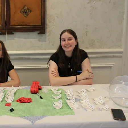 two women sitting at a table