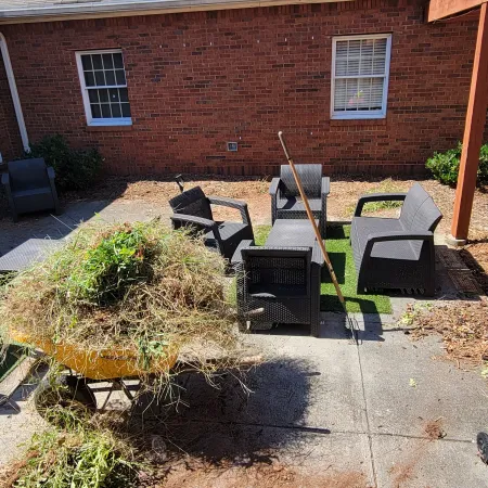 a backyard with a brick building