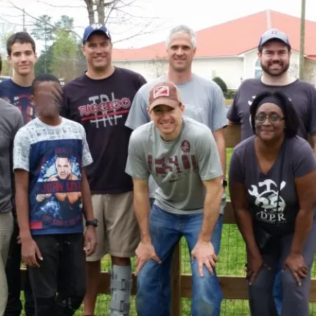 a group of people posing for a photo