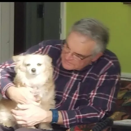 a person holding a dog